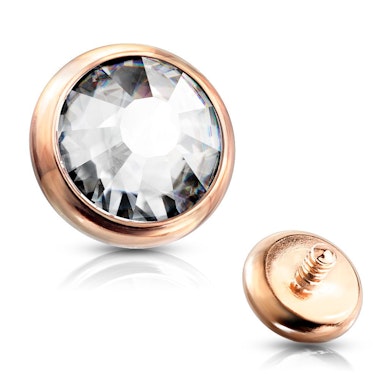 Microdermal topo com pedra em várias cores.