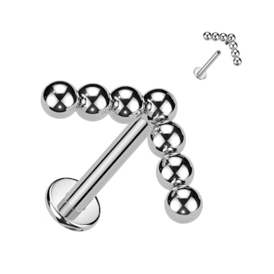 Labret em titânio com topo pontiagudo e com contas