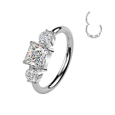 Argola articulada em titânio com três zircónias
