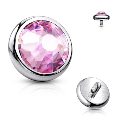 Topo de dermal em titânio com pedra colorida.