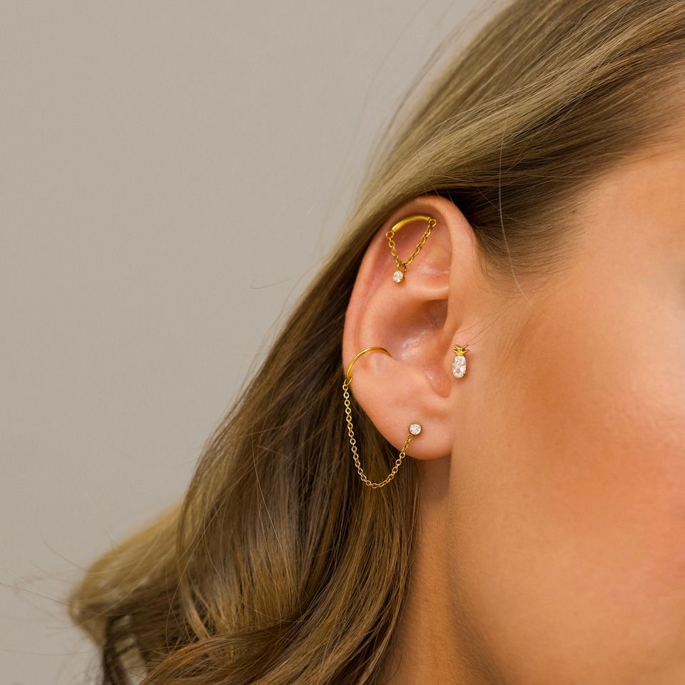 Labret com barra curva com corrente e pedra pendente