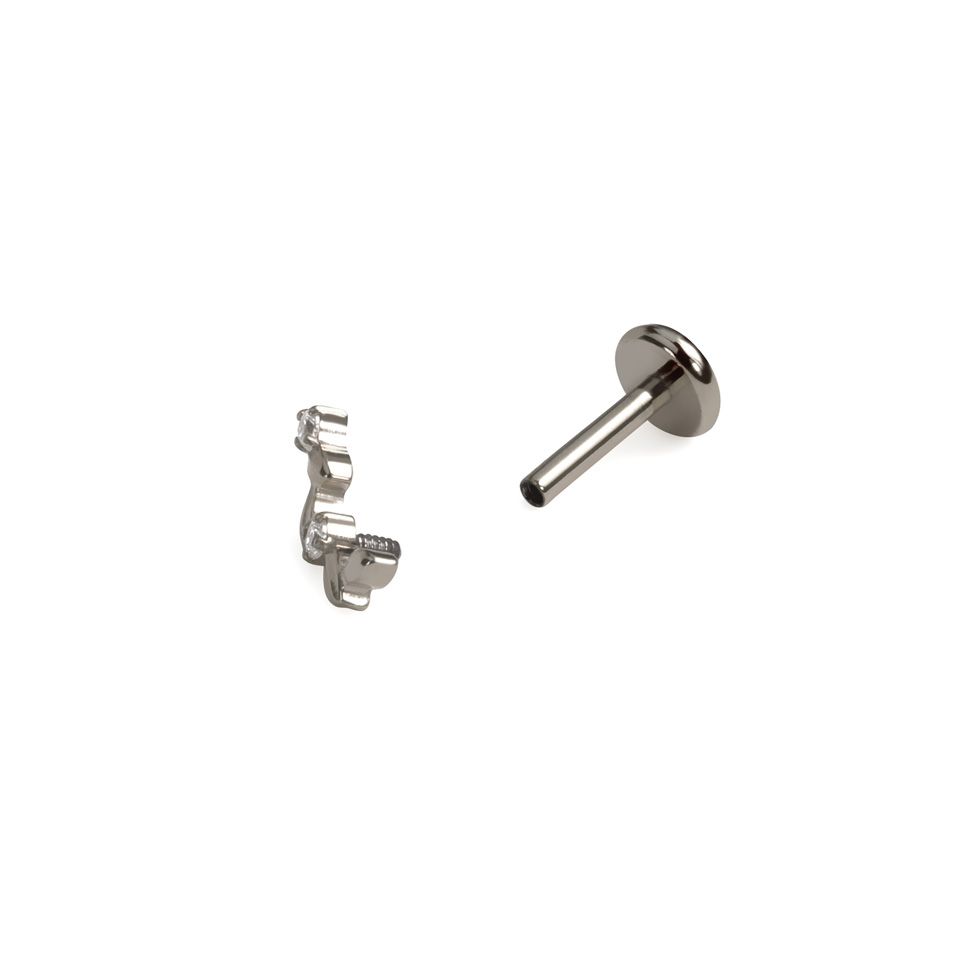 Labret em titânio com design curvo de folhas e gemas