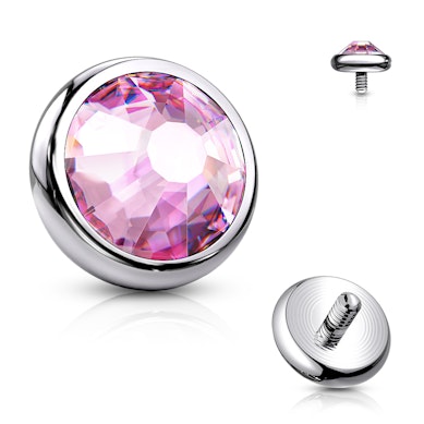 Topo de dermal em titânio com pedra colorida.