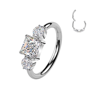 Argola articulada em titânio com três zircónias