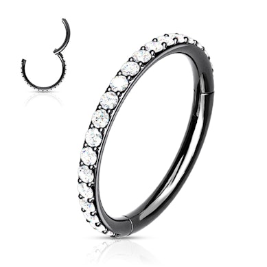 Argola articulada de aço cirúrgico com pedras à volta.