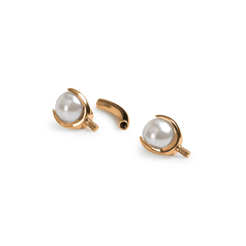 Banana em titânio com pérolas