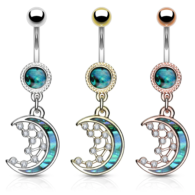 Umbigo piercing com lua crescente e estrelas