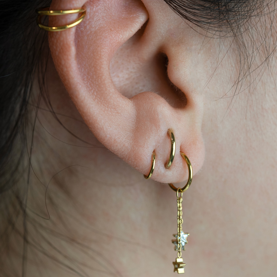 Pendente com três estrelas