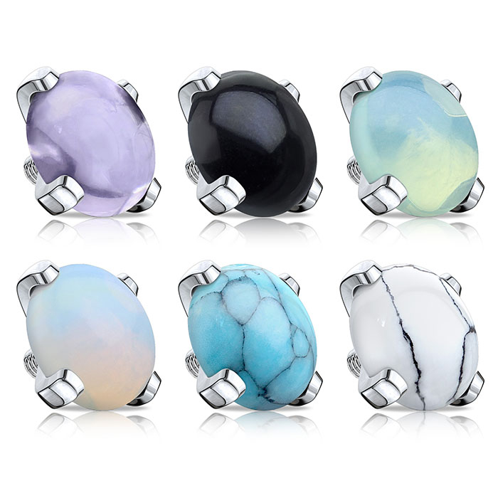 Topo de dermal com gemas presas com 4 garras