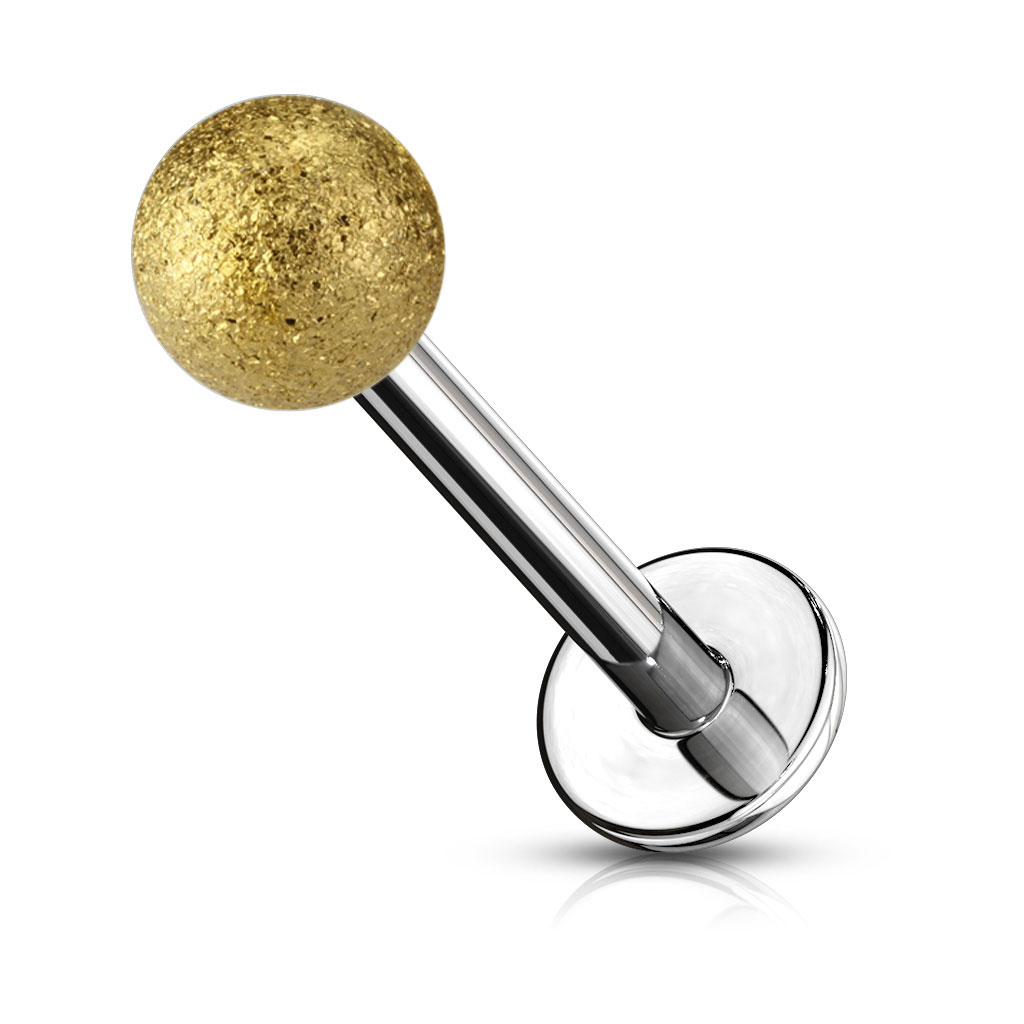 Labret com aspeto de diamante.