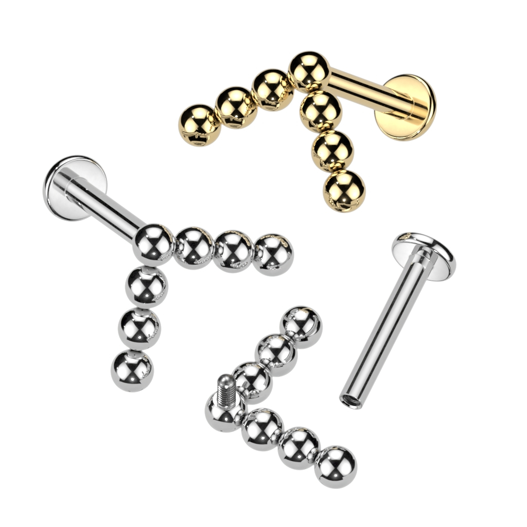 Labret em titânio com topo pontiagudo e com contas
