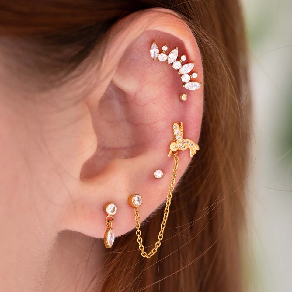 Labret com colibri e pedras
