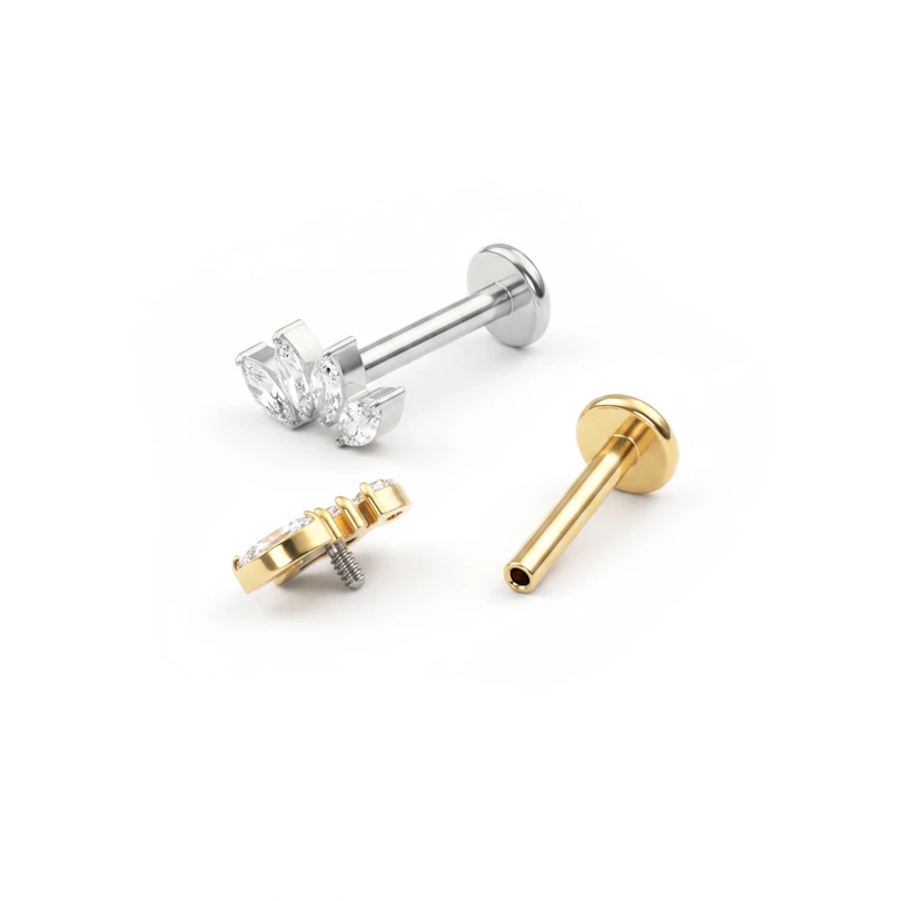 Labret em titânio com quatro pedras em corte marquesa