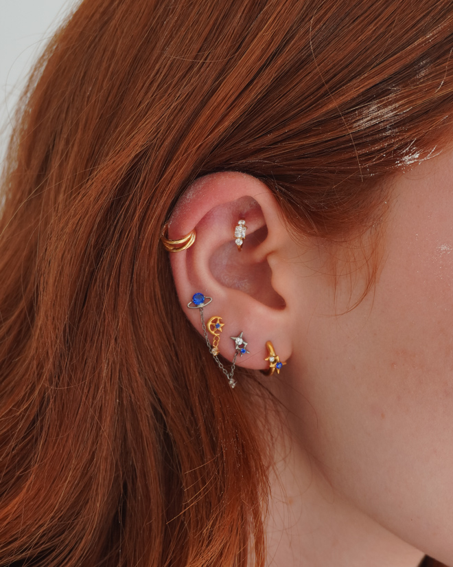 Labret em titânio com lua e estrela e pendente