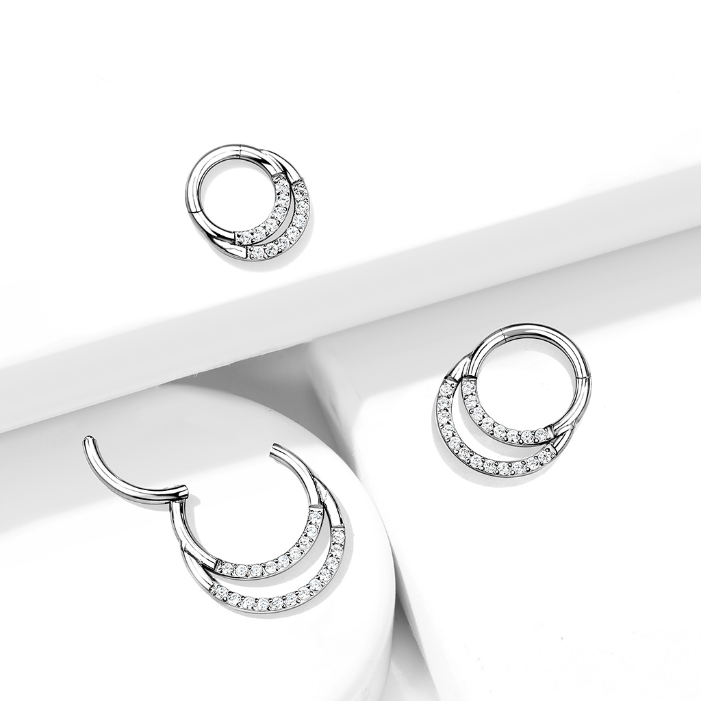 Argola articulada de titânio com duas filas de pedras